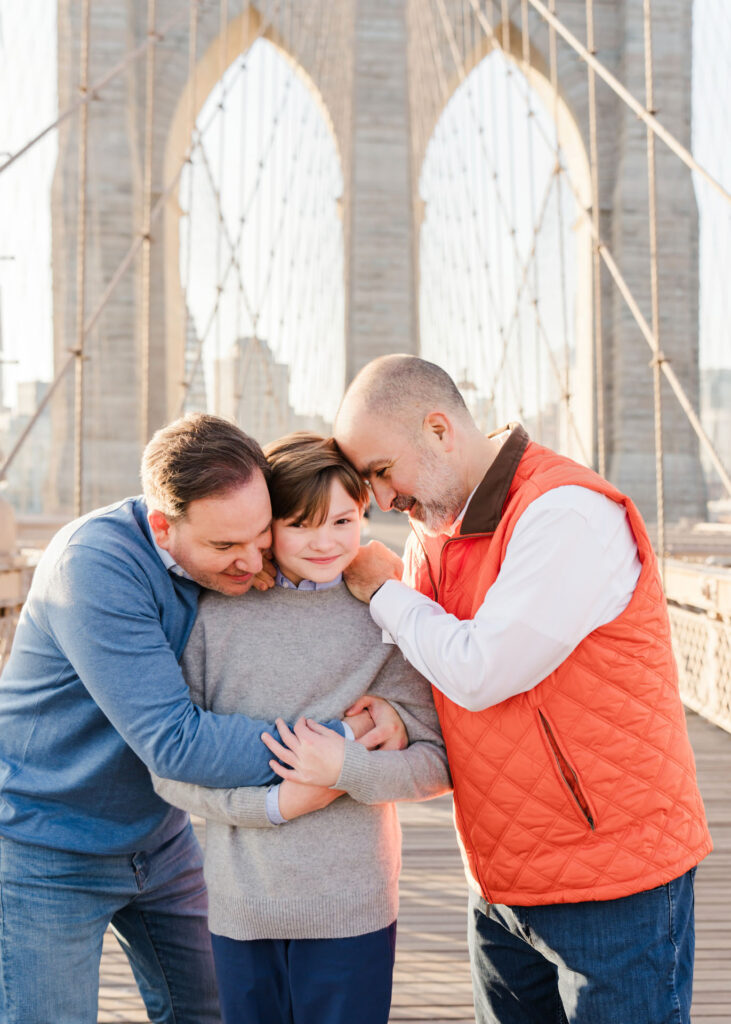 Family photos on the Brooklyn Bridge