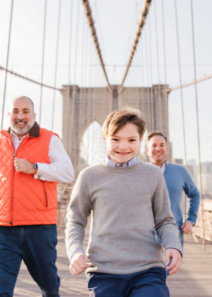Family photos on the Brooklyn Bridge